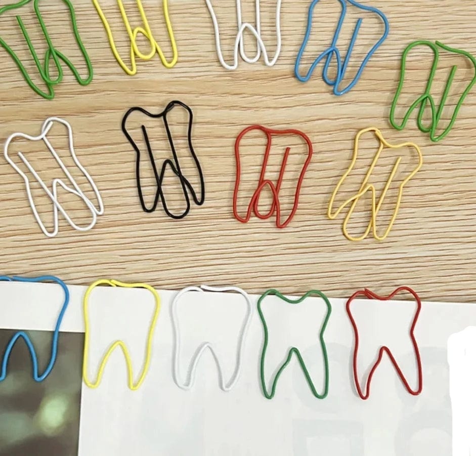 Get ready to add some fun to your homework or office work with these 50-piece Dentist Cute Tooth Clips! Made of durable plastic, these tooth-shaped paper clips are perfect for organizing your papers or adding a touch of creativity to your binder bookmark. They make a great gift for any dentist or dental clinic, and they are ideal for children and adults alike who love to study in a unique and playful way. Don't miss out on these charming and practical dentist supplies; get your pack today!